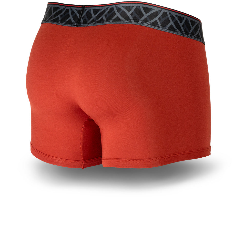 Red men's trunks featuring a contoured Pouch for support without a fly, a grey patterned waistband. and a 2" inseam. Back Image.