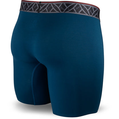 Blue athletic shorts with a patterned waistband on a white background