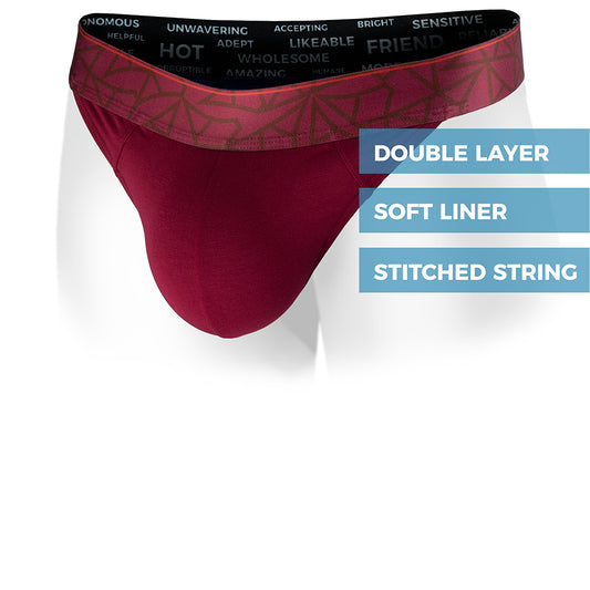 Lahaina Red men's thong featuring a contoured Pouch with mesh liner for support without a fly and patterned waistband. Front Image.