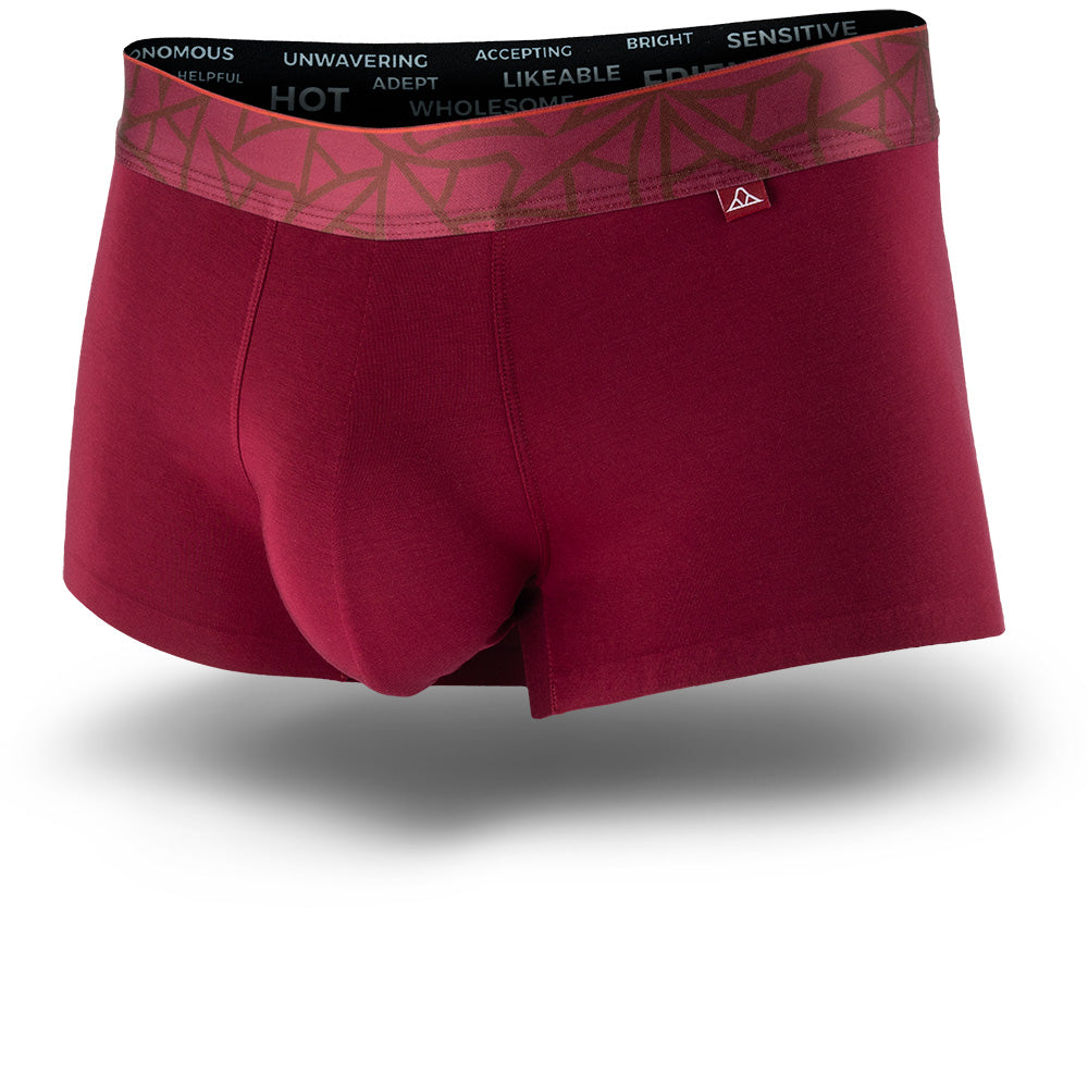 Lahaina Red men's trunks featuring a contoured Pouch with mesh liner for support without a fly, patterned waistband, seamless hems and a 1.5" inseam. Front Image.