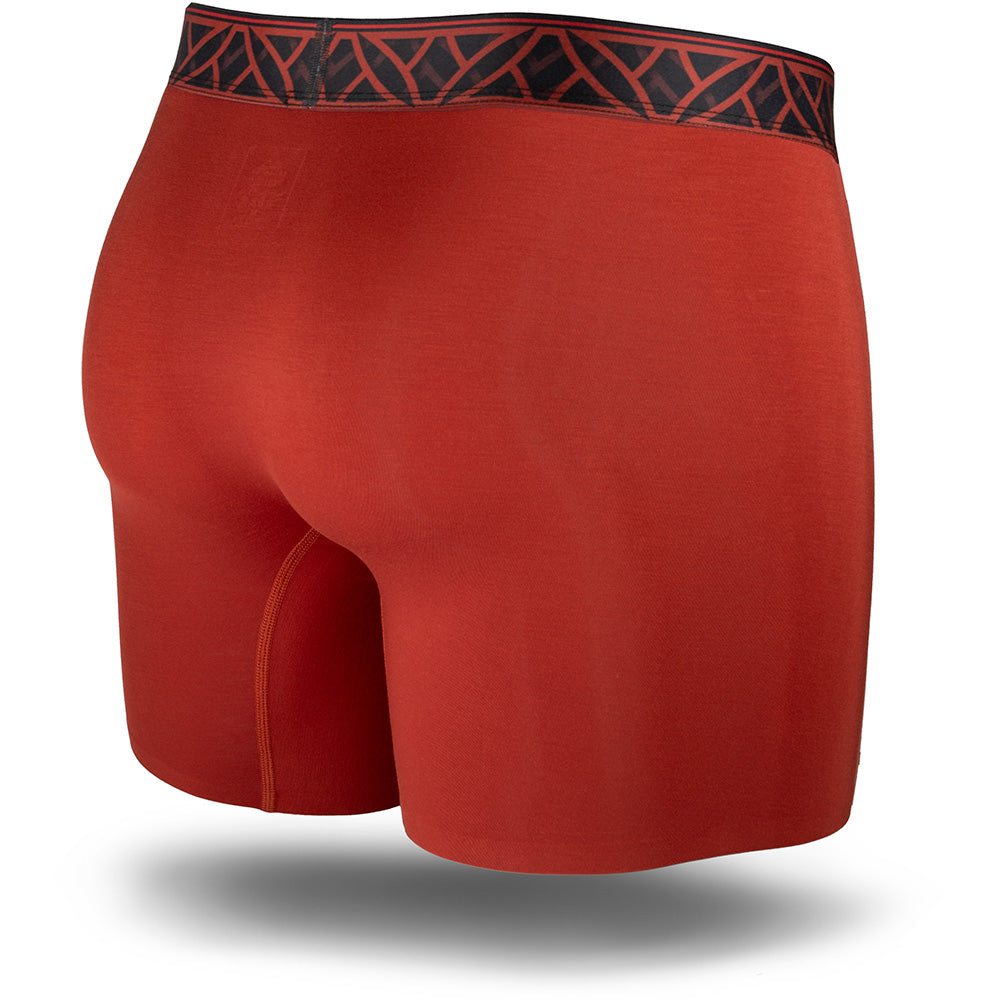Red boxer briefs with black waistband on a white background