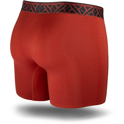 Red boxer briefs with black waistband on a white background