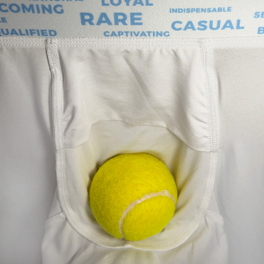 Yellow tennis ball in a white pocket with text overlay on a gray background