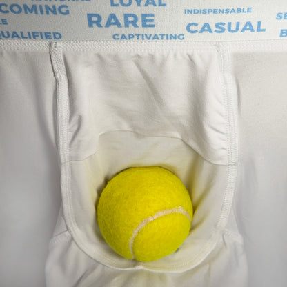 Yellow tennis ball in a white pocket with text overlay on a gray background