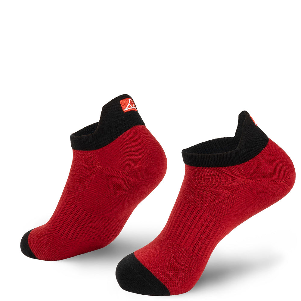 Fire red cotton no-show socks with black toe cap.