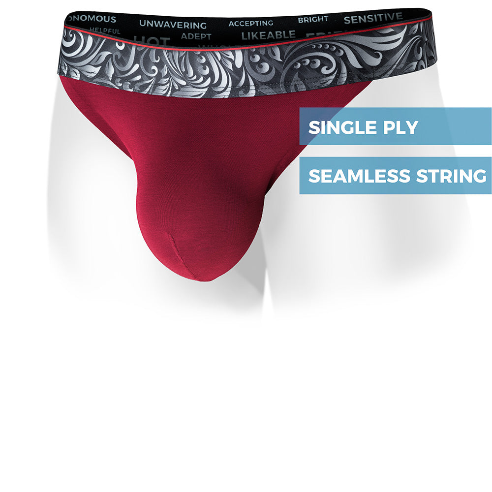 Lahaina Red Vesuvius Thong with a patterned waistband on a white background. Front view.
