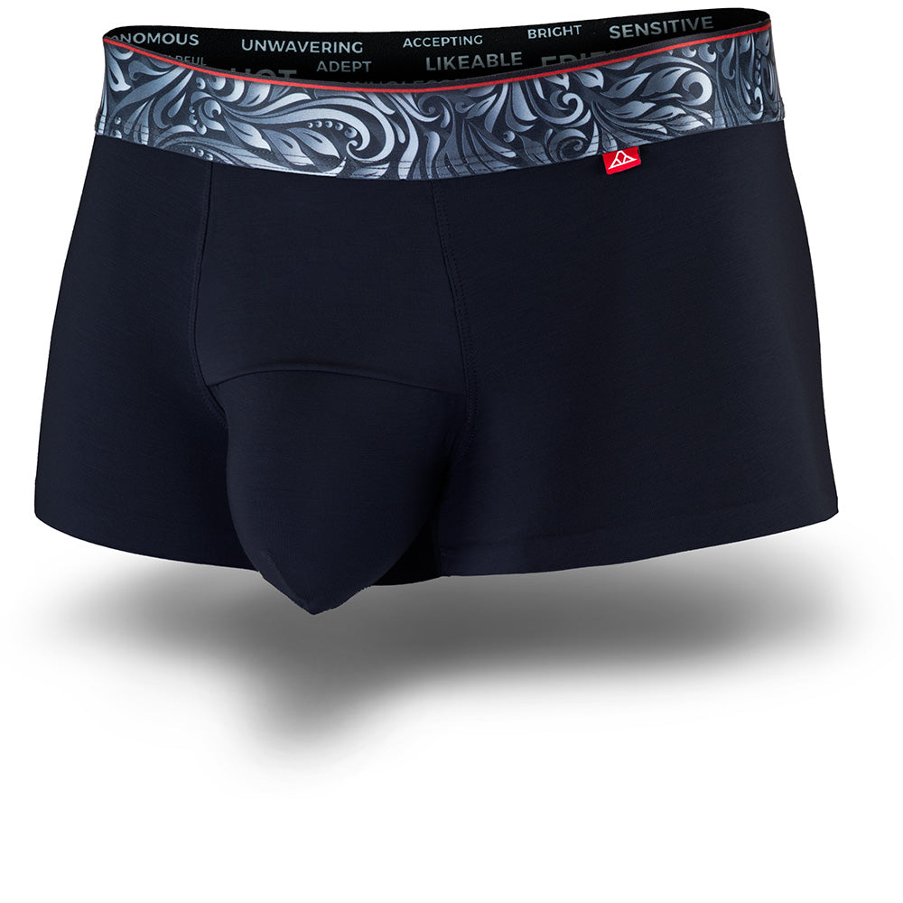 Black men's trunks featuring a contoured "Caldera Pouch" for support, a grey patterned waistband, and a 1.5" inseam. Front Image.