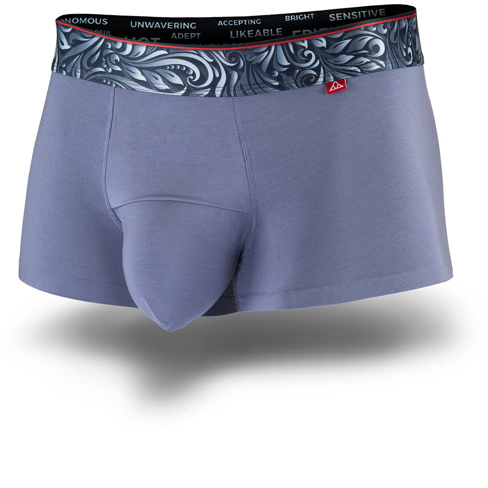 Grey men's trunks featuring a contoured "Caldera Pouch" for support, a grey patterned waistband, and a 1.5" inseam. Front Image.