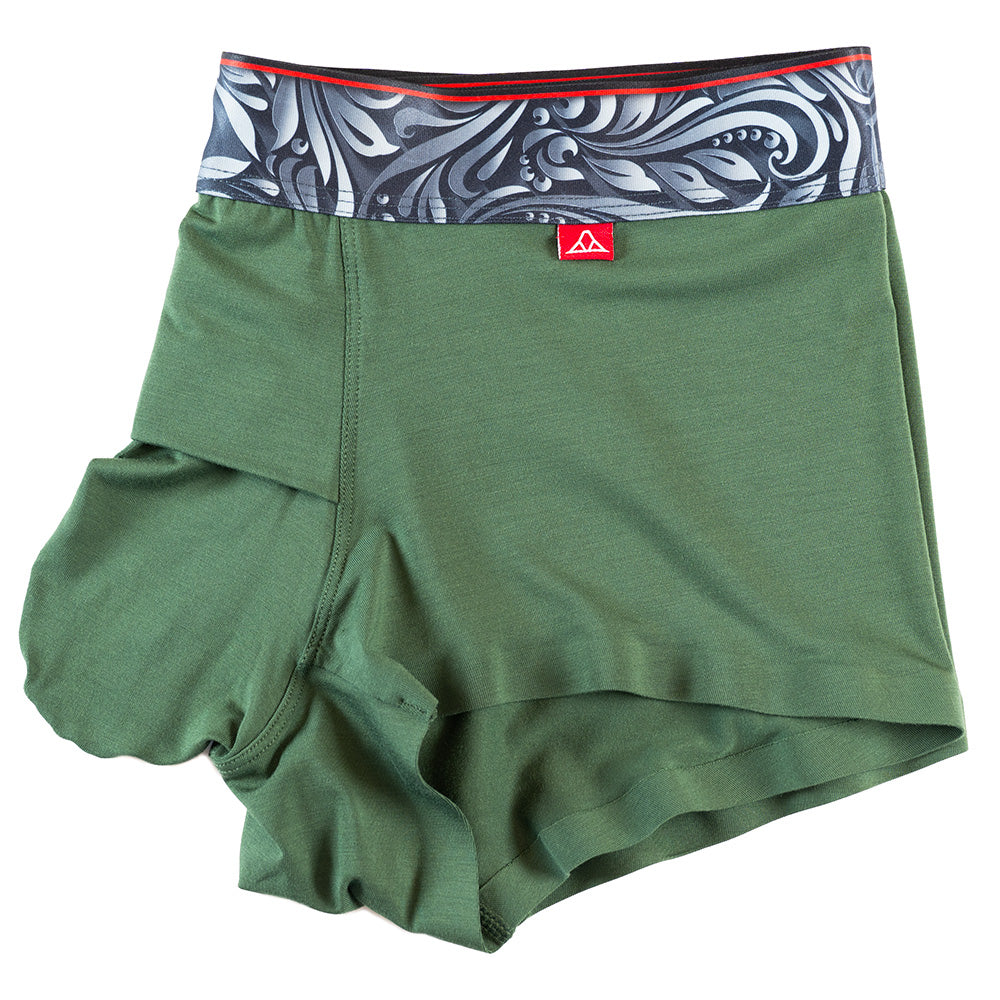 Dark Green men's trunks featuring a contoured "Caldera Pouch" for support, a grey and green patterned waistband, and a 1.5" inseam. Side Image.