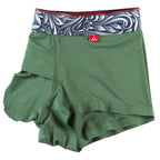 Dark Green men's trunks featuring a contoured "Caldera Pouch" for support, a grey and green patterned waistband, and a 1.5" inseam. Side Image.