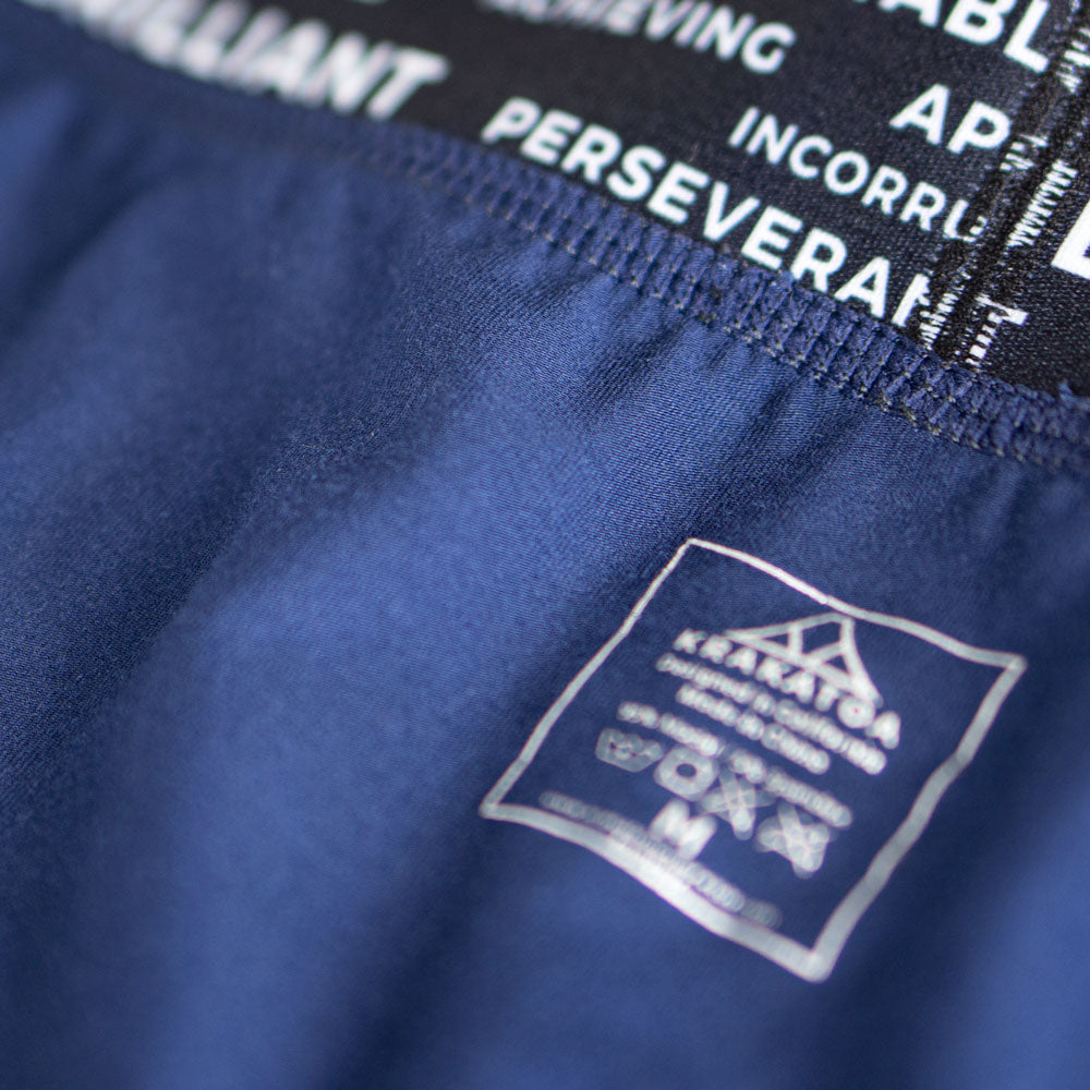 Close up of anti-gravity tag screened into the garment.